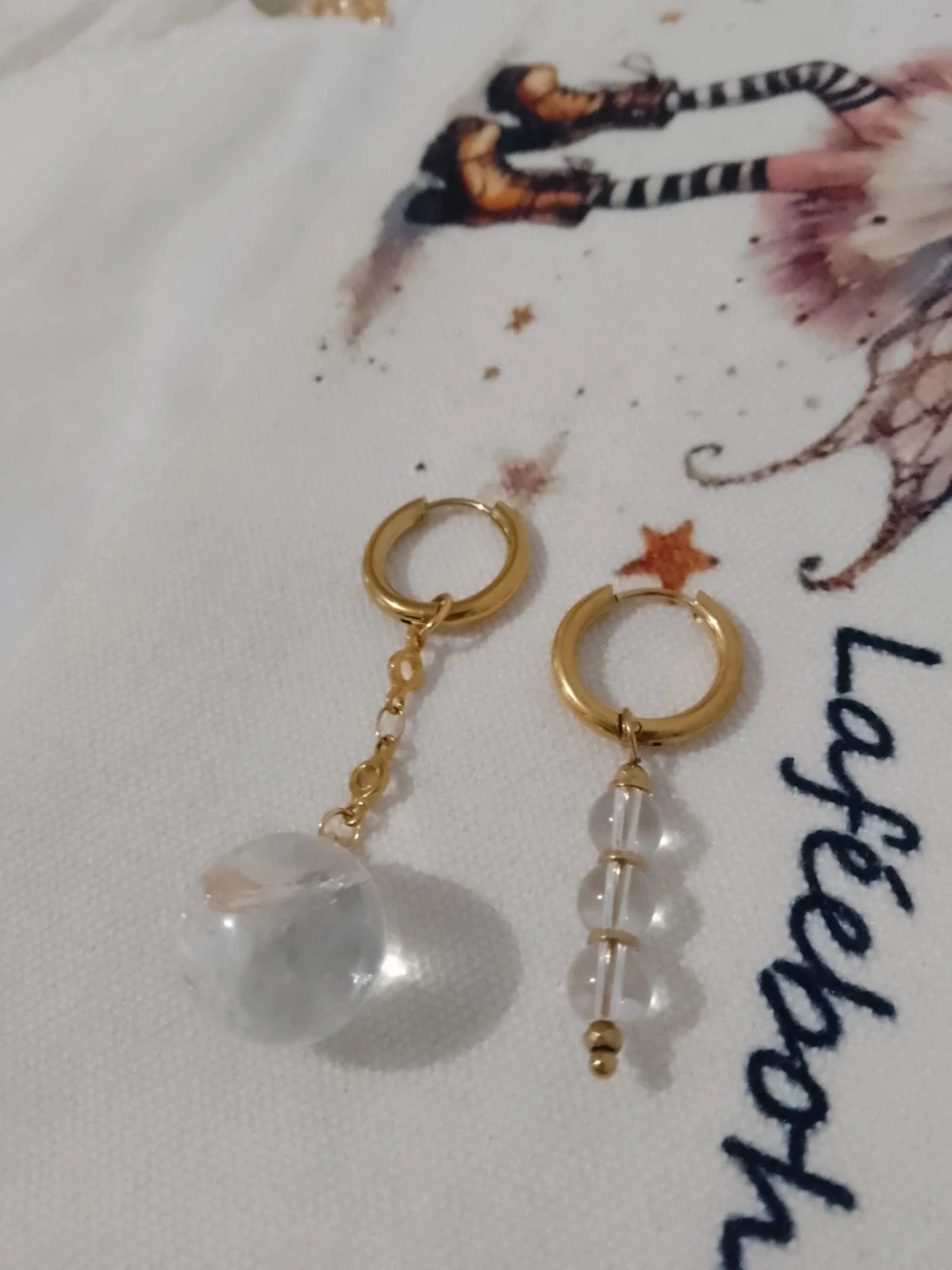 Boucles d'oreilles bohèmes asymétriques cristal de roche